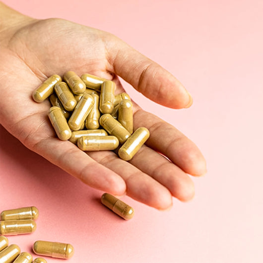 10-product-capsules-in-hand