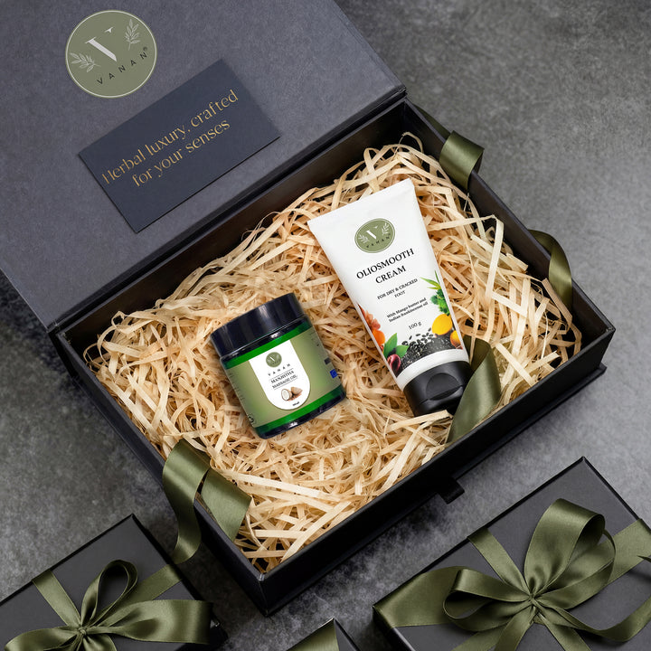 Gift set with jar and tube in a decorative box on a gray background